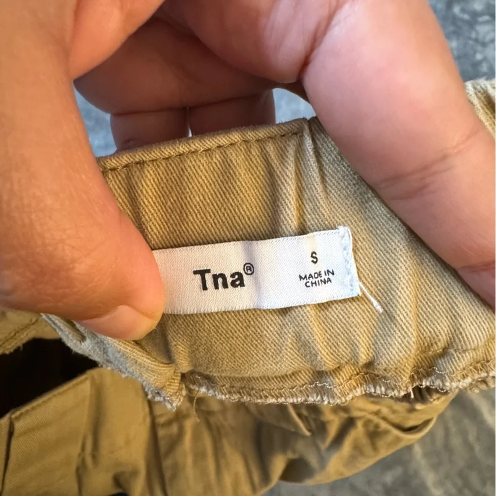 TNA Tan Track Pants for Women

#1244 - Picture 9 of 12